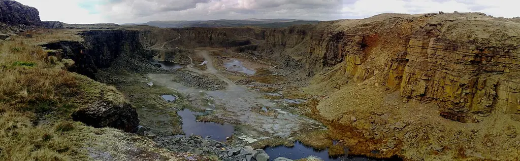 Rock walls and pools in Lee Quarry, viewed from its mountain-bike trail
